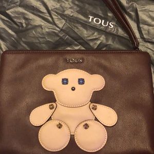Never used Tous burgundy wristlet.